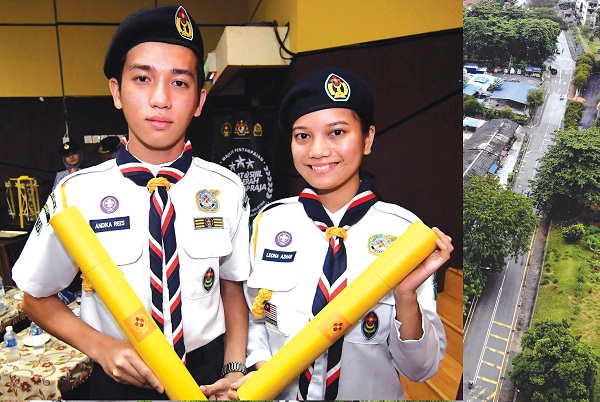 ANDIKA Rees Pahamin (kiri) bersama Kasih Iris Leona bergambar bersama Anugerah Pengakap Diraja.