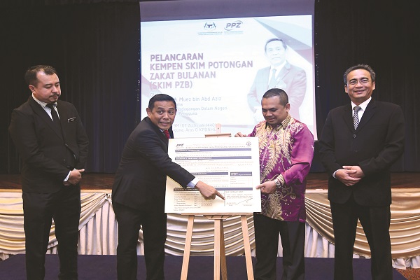 MUEZ (dua dari kiri) merasmikan Pelancaran Skim PZB sambil disaksikan Ahmad Shukri di KPDNHEP, Putrajaya baru-baru ini.